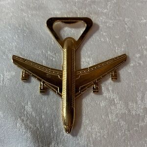 🎄Very cool and Unique Gold Airplane Bottle Opener like new!!